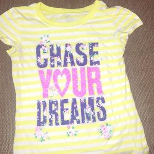 yellow and white striped top with floral design